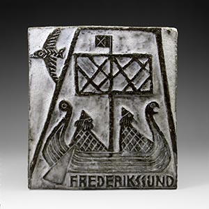 Wall plaque/relief by Haakon Darger depicting a Viking boat under sail.